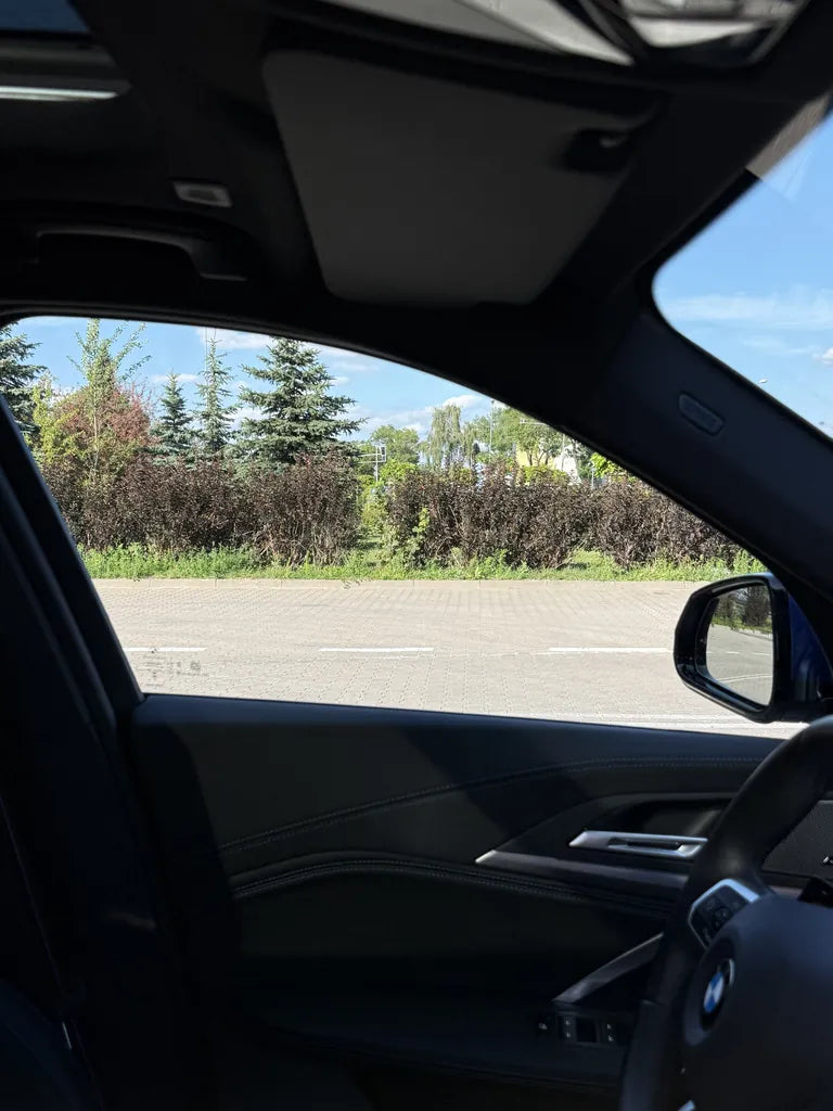 View from the driver's seat through a window with no tint panel